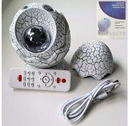 Proyector Dino Egg Parlante Bluetooth - Estrellas, Auroras Boreales, Luz de Noche y Ruido Blanco ✦ Bajo pedido